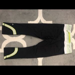 Black, green, and white cropped Lulu leggings